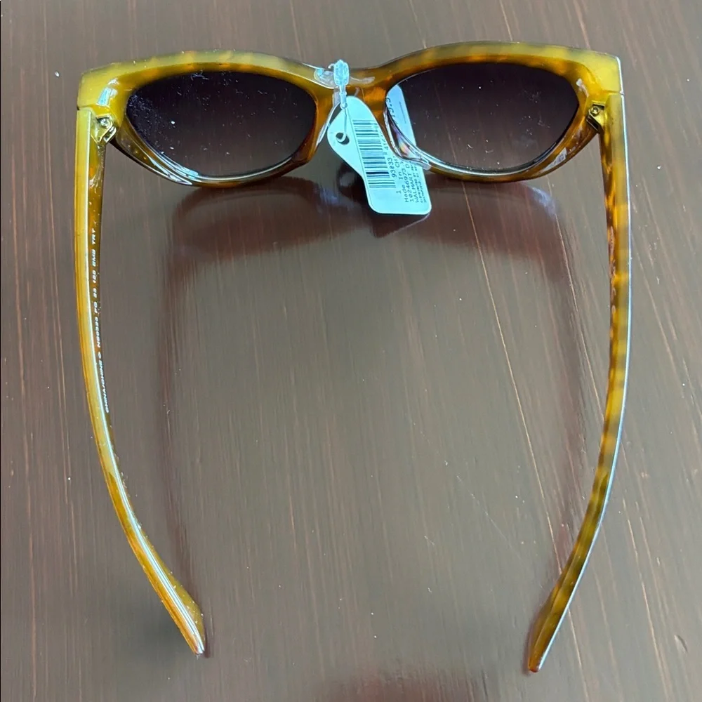 Foster Grant 100% UVA-UVB protection leopard print, gold tone beaded frame edge